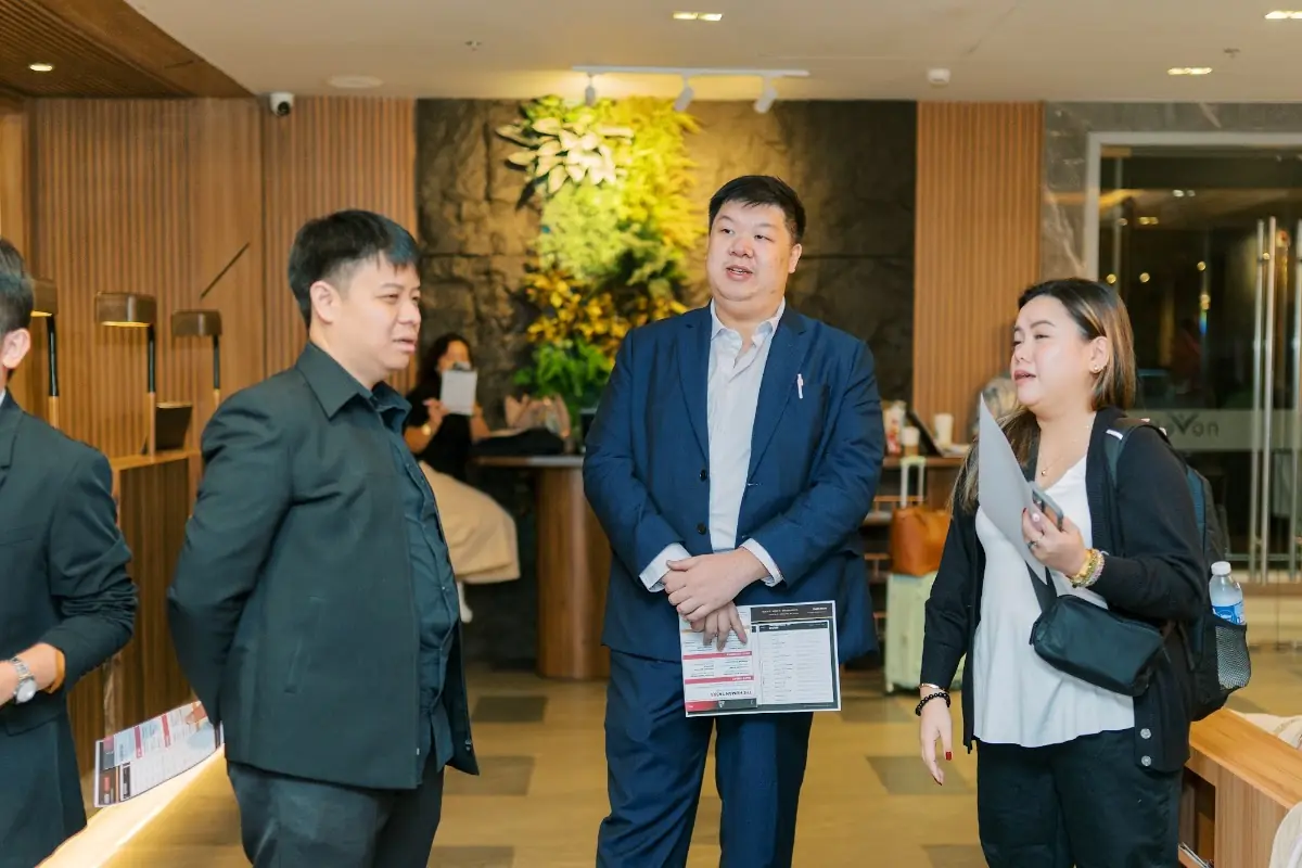 Guests talking in the hotel lobby