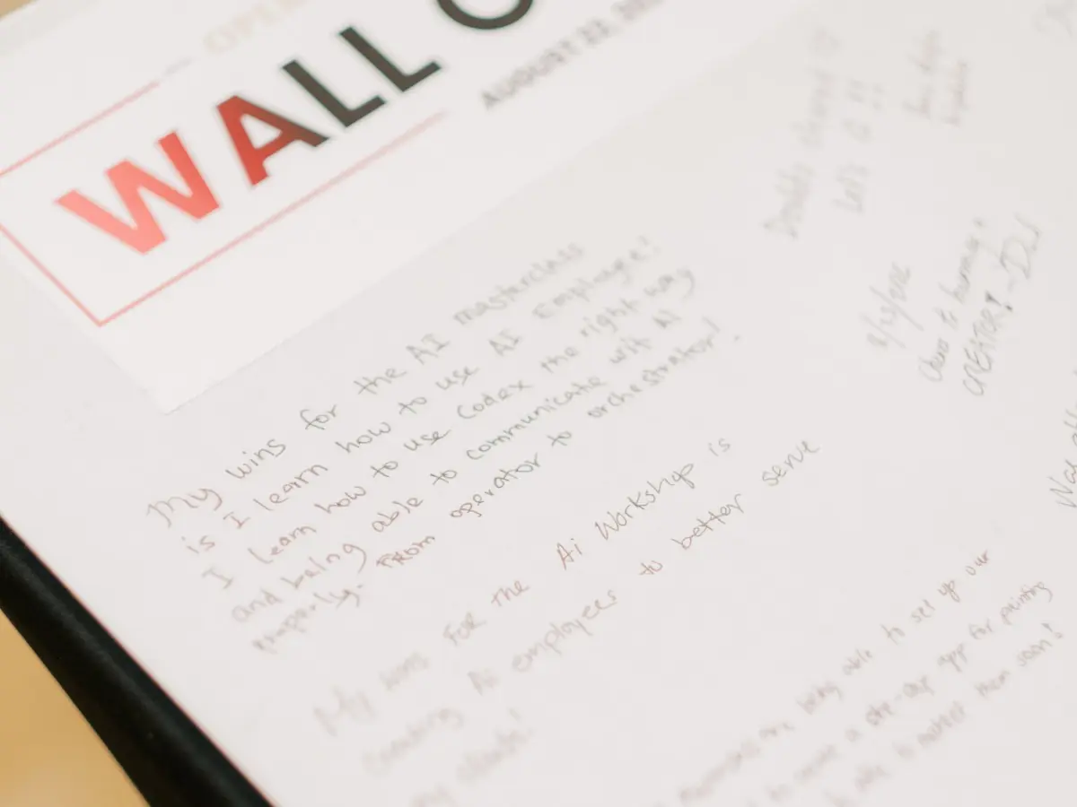 Handwritten notes on the wins wall